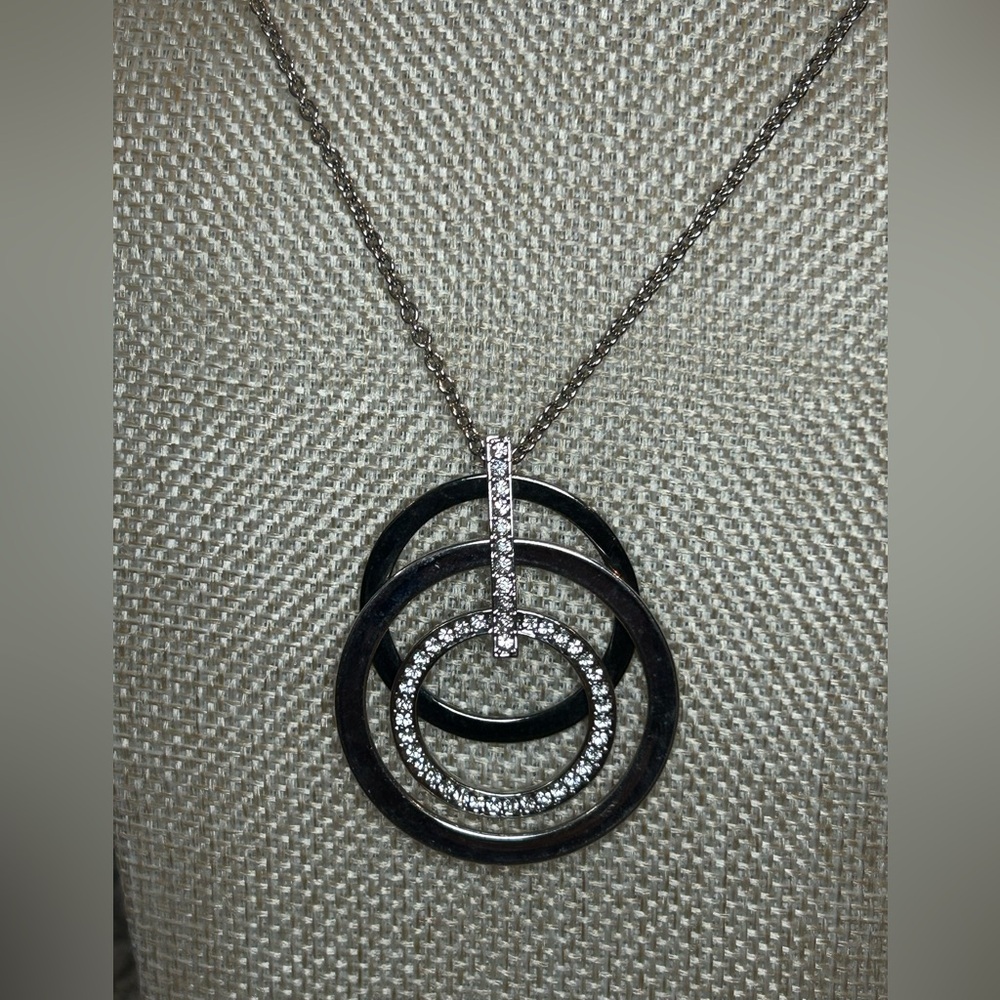 Touchstone Crystal Three Ring Necklace